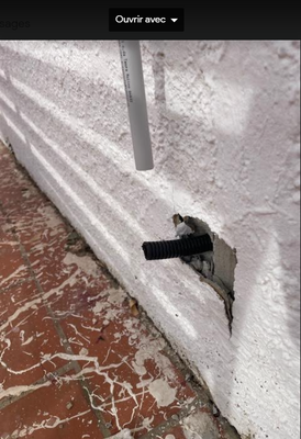 mur  troué  sous  conseil de SFR